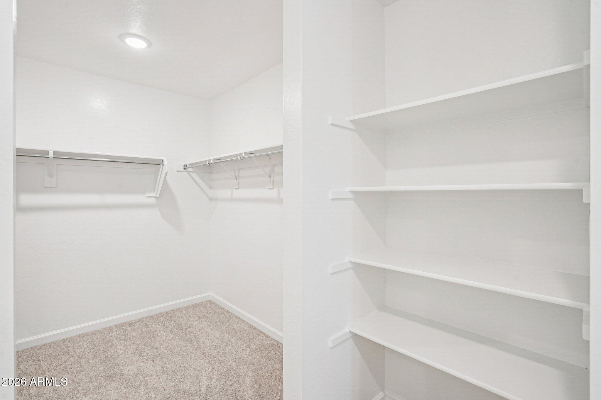 47638 West Moeller Road Maricopa, AZ 85139 - Photo 34 of 56 a view of an empty walk in closet