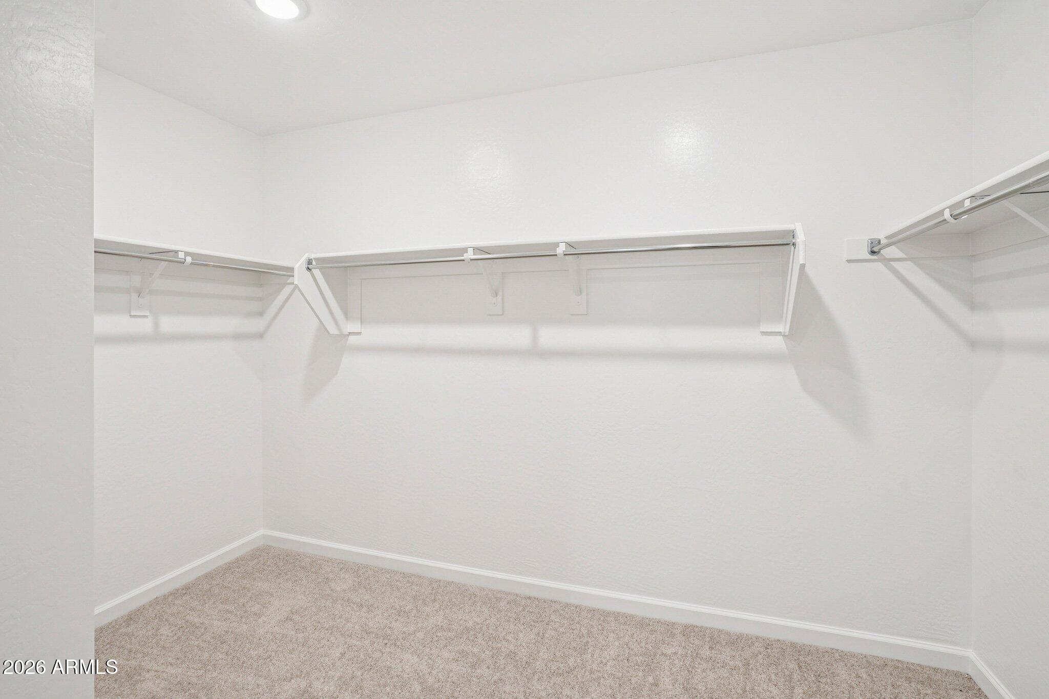 47638 West Moeller Road Maricopa, AZ 85139 - Photo 37 of 56 a view of an empty walk in closet