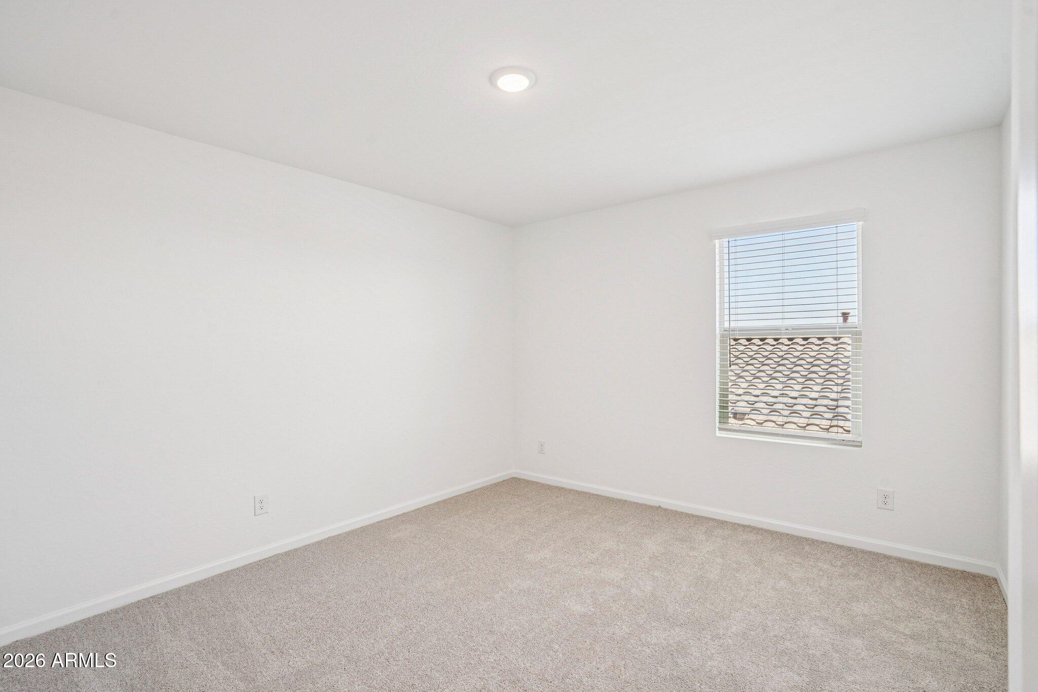 47638 West Moeller Road Maricopa, AZ 85139 - Photo 42 of 56 an empty room with a window