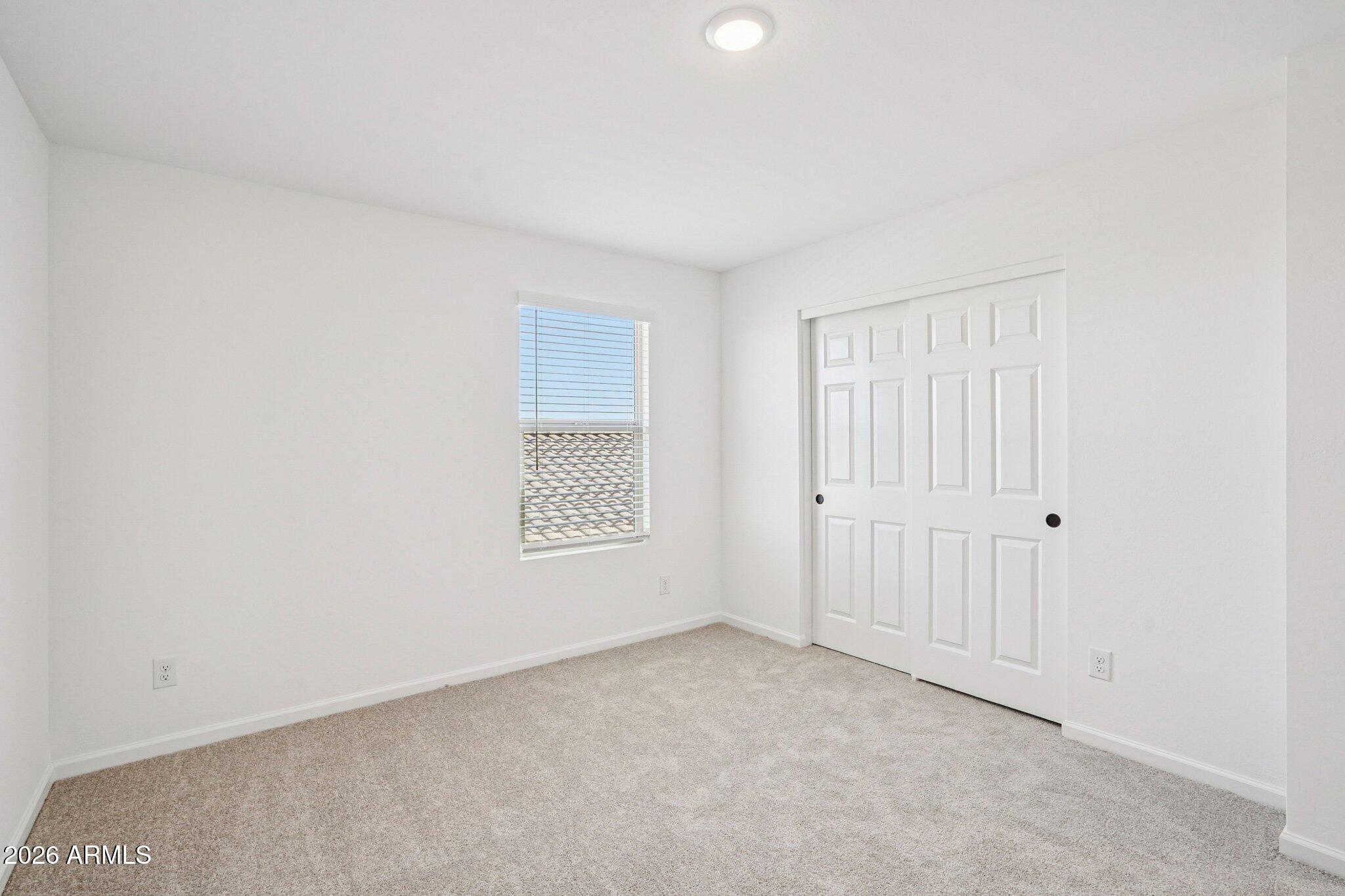 47638 West Moeller Road Maricopa, AZ 85139 - Photo 43 of 56 a view of an empty room and a window