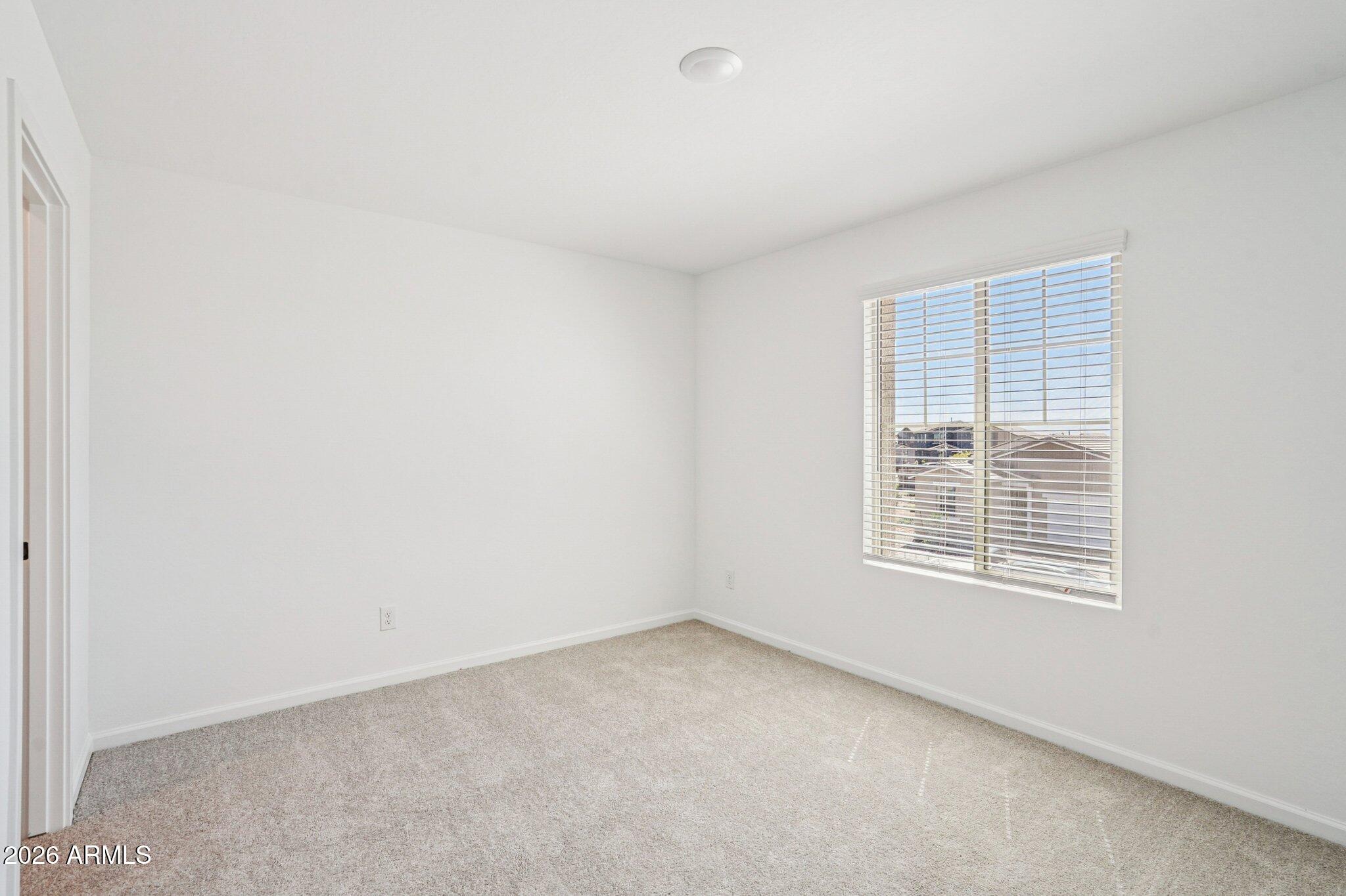 47638 West Moeller Road Maricopa, AZ 85139 - Photo 49 of 56 an empty room with a window