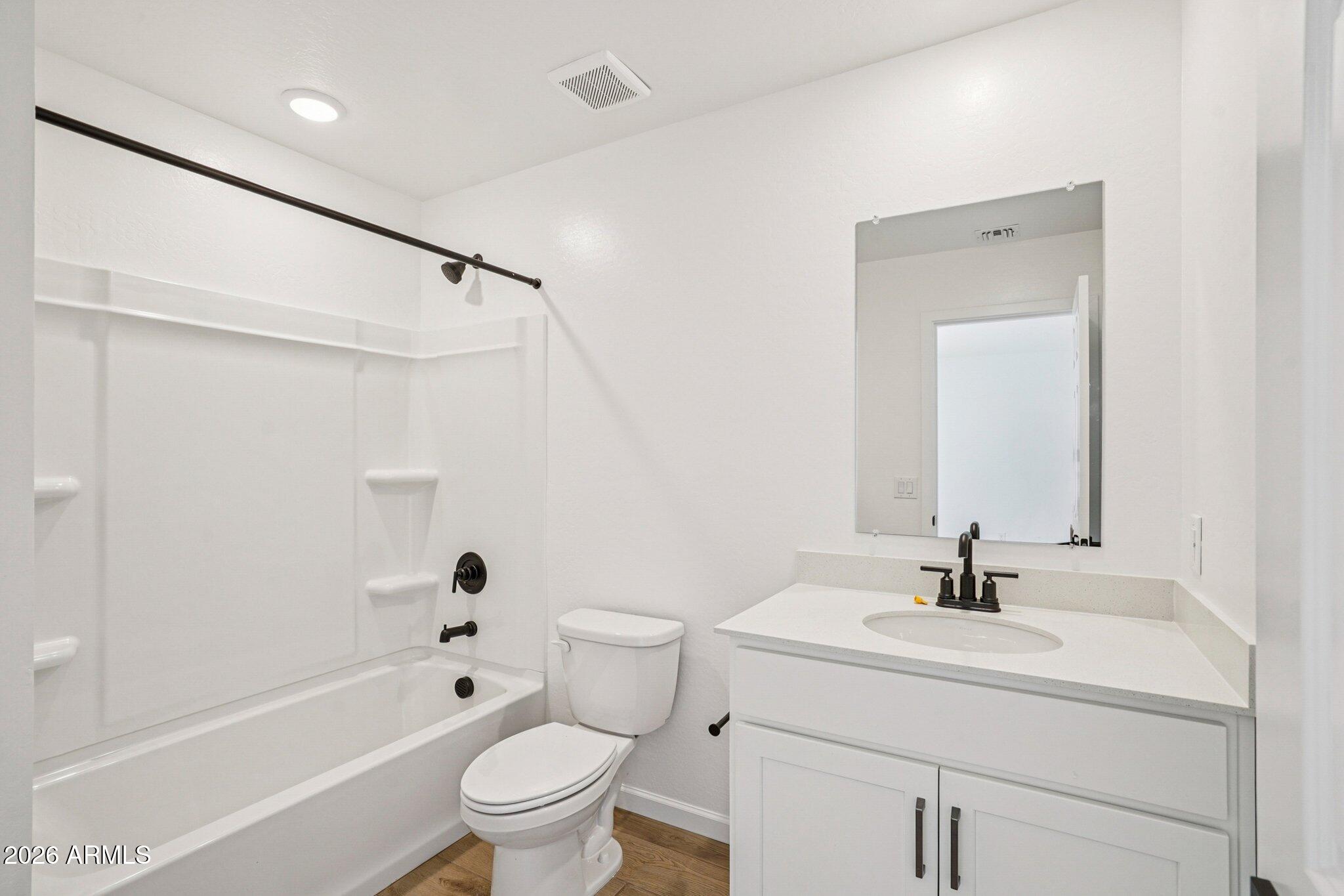 47638 West Moeller Road Maricopa, AZ 85139 - Photo 50 of 56 a bathroom with a sink toilet and shower