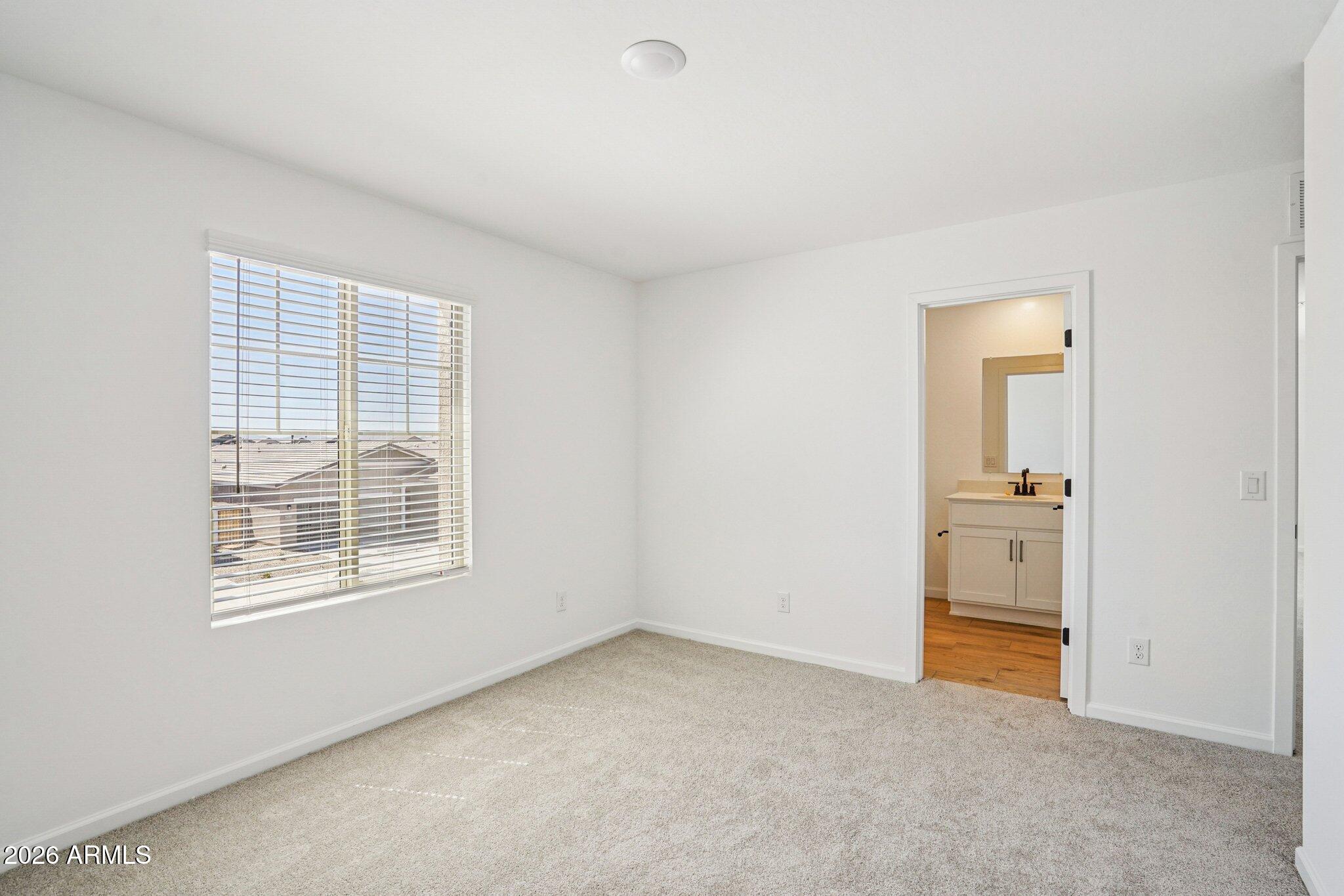 47638 West Moeller Road Maricopa, AZ 85139 - Photo 52 of 56 a view of an empty room with a window