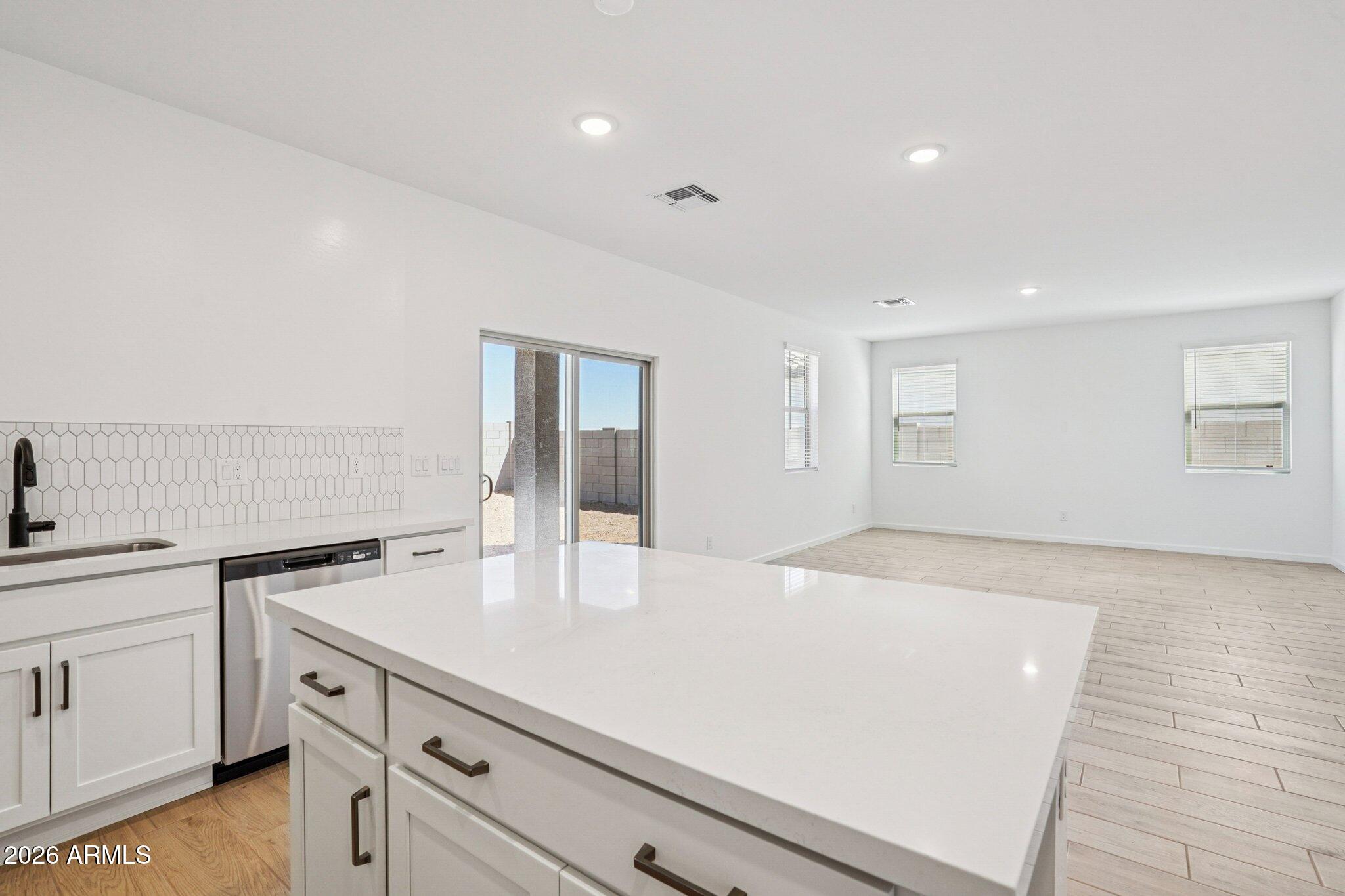 47638 West Moeller Road Maricopa, AZ 85139 - Photo 10 of 56 a kitchen with a sink and cabinets