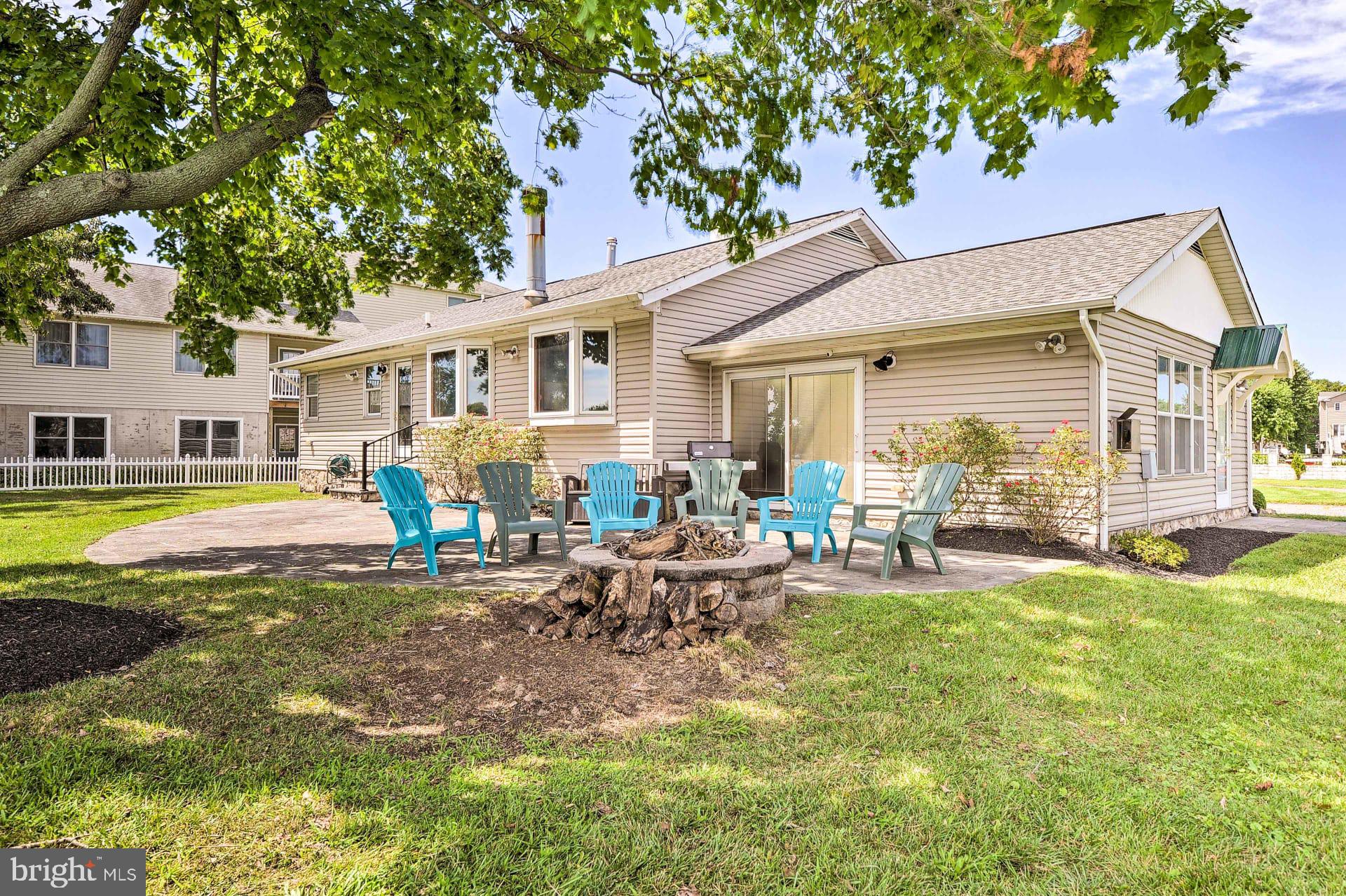 919 Oakdene Road Middle River, MD 21220 - Photo 12 of 26 Charming backyard retreat with fire pit.