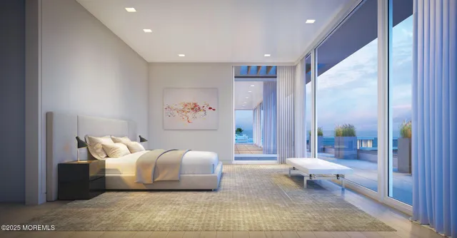 a room with a couch and a large window