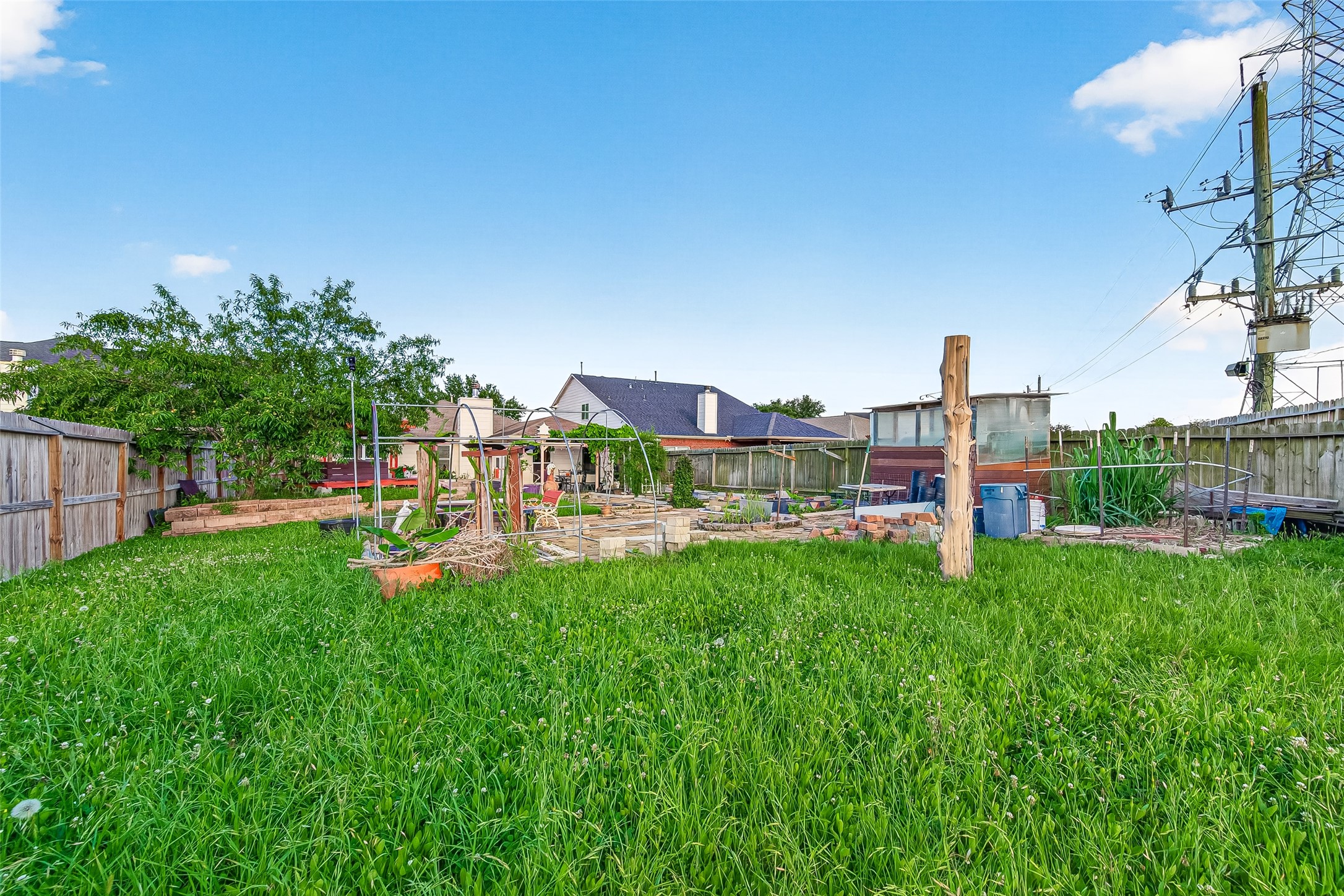 16715 Mackenzie Mesa Drive Spring, TX 77379 - Photo 49 of 50 a view of a garden with a slide