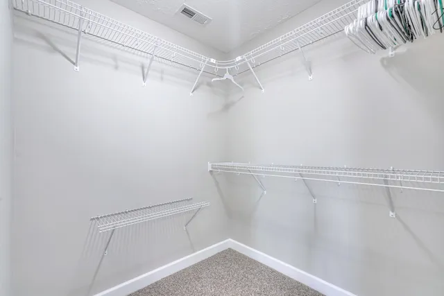 a view of a room with racks on the wall