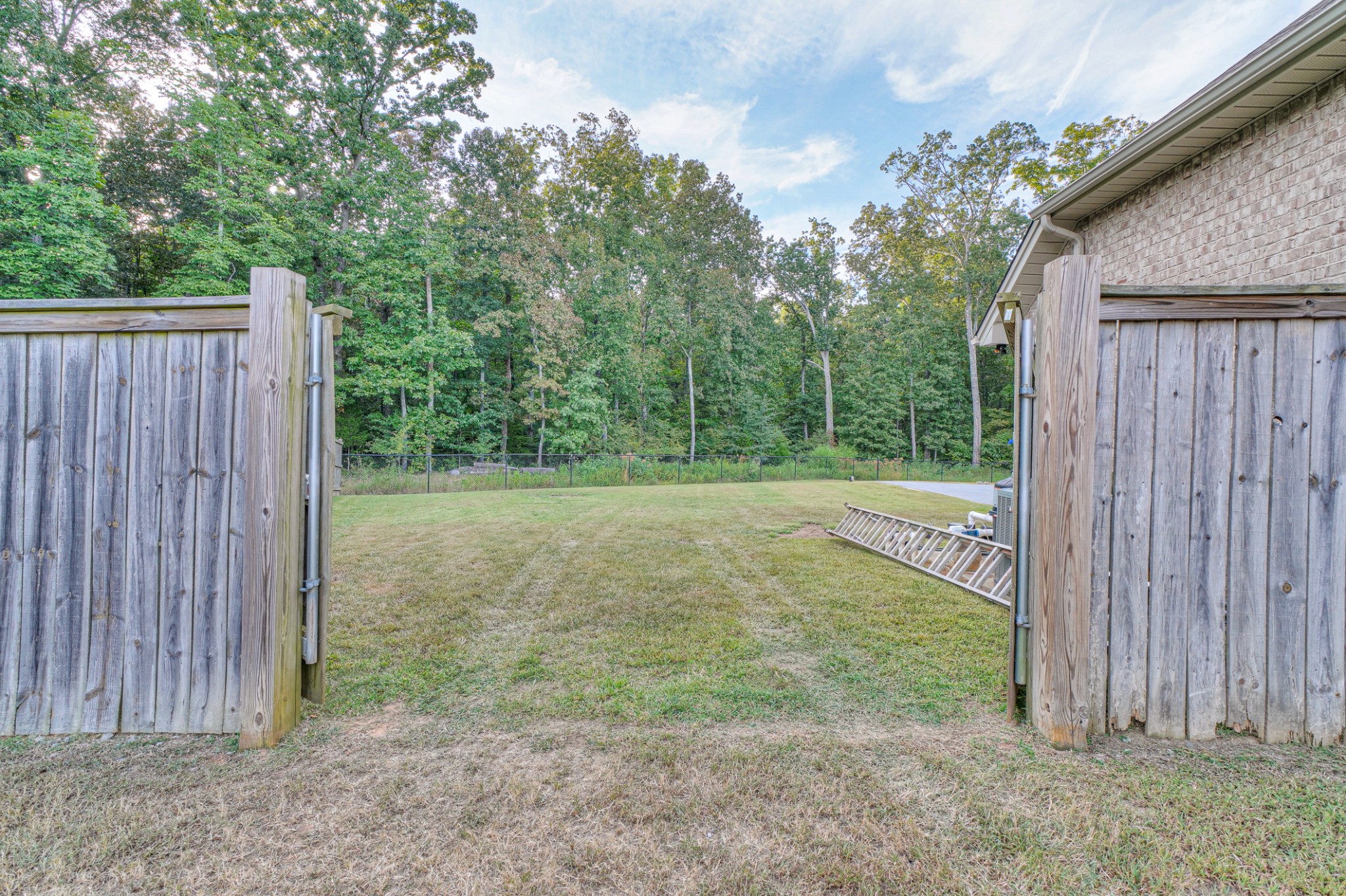 1485 Round Rock Drive Murfreesboro, TN 37128 - Photo 39 of 39 a view of a backyard with wooden fence
