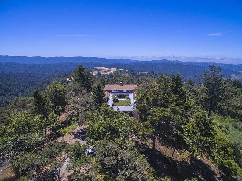 227 Rapley Ranch Road La Honda, CA 94020 - Photo 1 of 35 a view of a city with sunset view