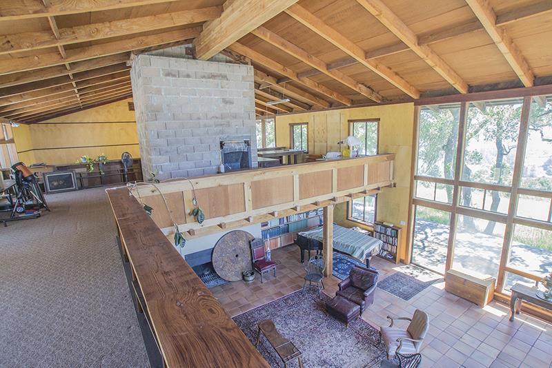 227 Rapley Ranch Road La Honda, CA 94020 - Photo 14 of 35 a living room with furniture and a large window
