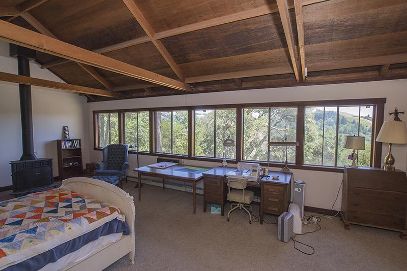 227 Rapley Ranch Road La Honda, CA 94020 - Photo 16 of 35 a room with furniture and a large window