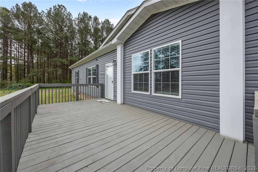 2252 Old Stage Road South Erwin, NC 28339 - Photo 34 of 47 a view of a house with a deck