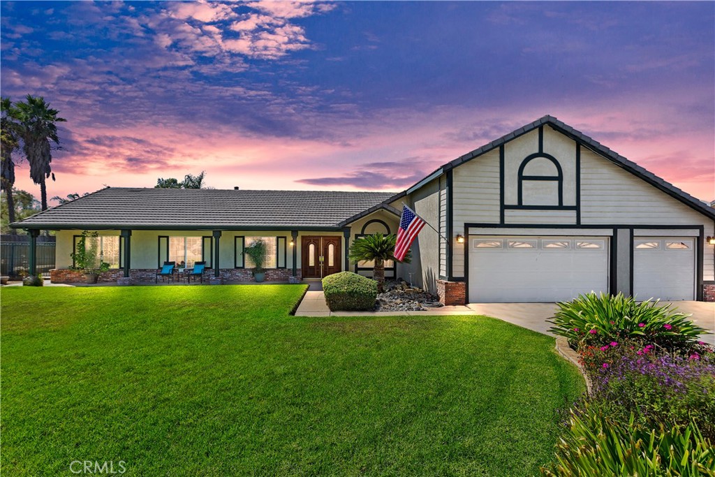 17411 Kaison Circle Riverside, CA 92508 - Photo 1 of 51 a front view of a house with yard and green space