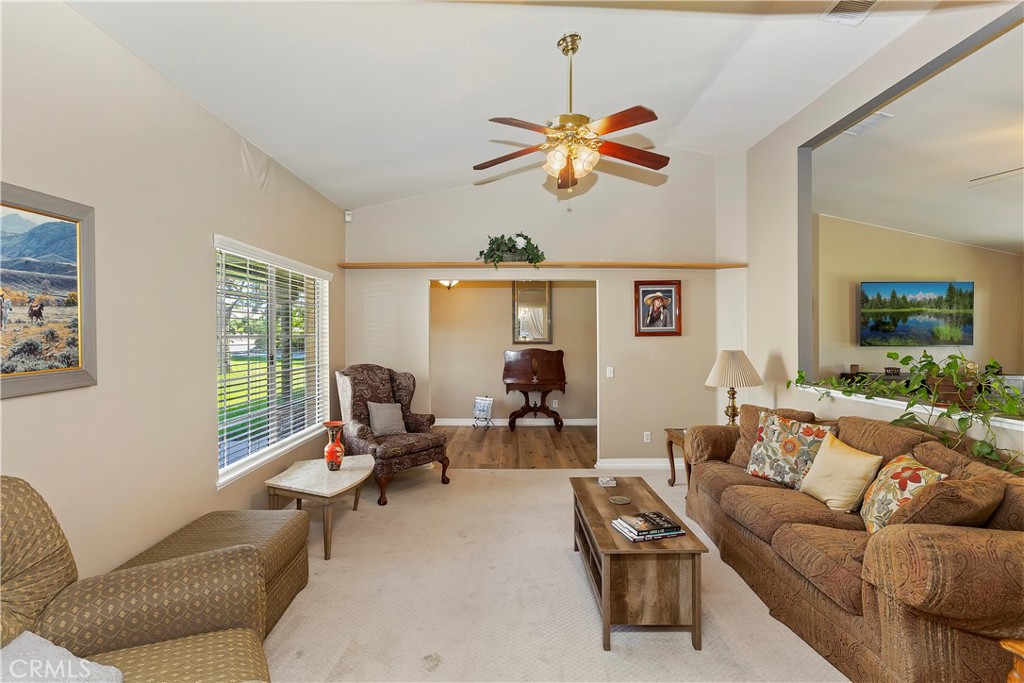 17411 Kaison Circle Riverside, CA 92508 - Photo 11 of 51 a living room with furniture and a large window