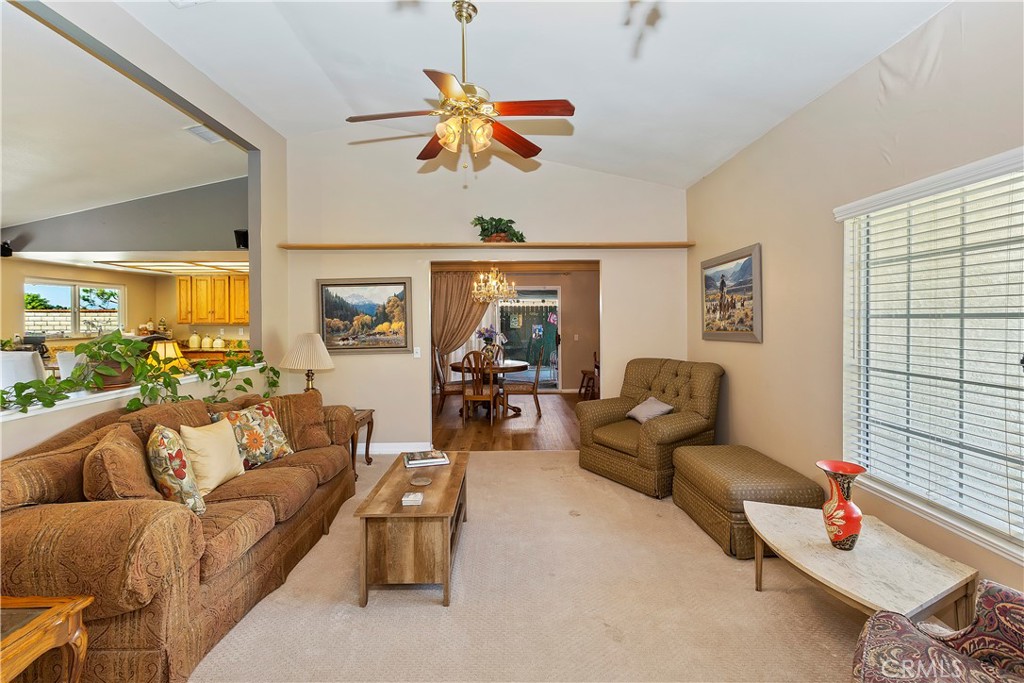 17411 Kaison Circle Riverside, CA 92508 - Photo 12 of 51 a living room with furniture fireplace and a large window