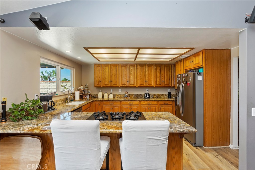 17411 Kaison Circle Riverside, CA 92508 - Photo 17 of 51 a view of a kitchen with furniture and a window