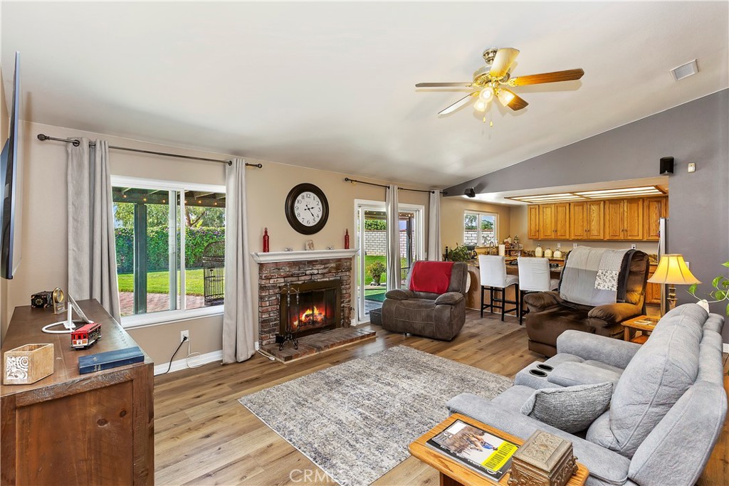 17411 Kaison Circle Riverside, CA 92508 - Photo 19 of 51 a living room with furniture and a fireplace