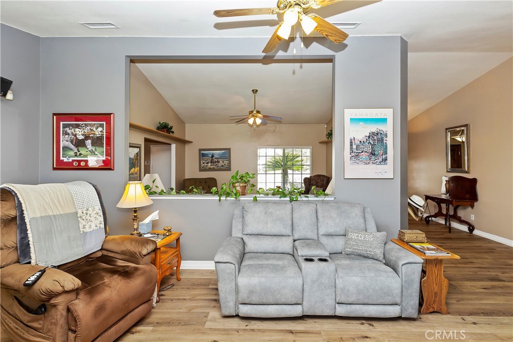 17411 Kaison Circle Riverside, CA 92508 - Photo 20 of 51 a living room with furniture and wooden floor