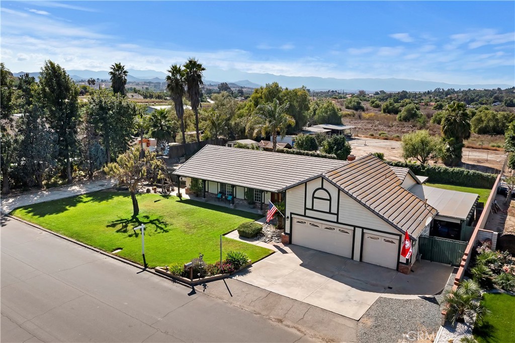 17411 Kaison Circle Riverside, CA 92508 - Photo 2 of 51 an aerial view of a house with swimming pool patio and outdoor seating