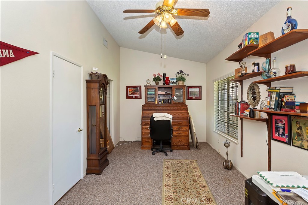 17411 Kaison Circle Riverside, CA 92508 - Photo 23 of 51 a view of a room with workspace and toys
