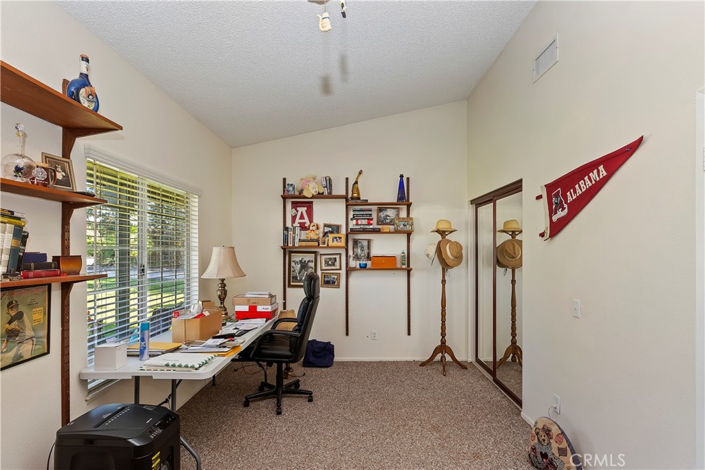 17411 Kaison Circle Riverside, CA 92508 - Photo 24 of 51 a view of a room with gym equipment