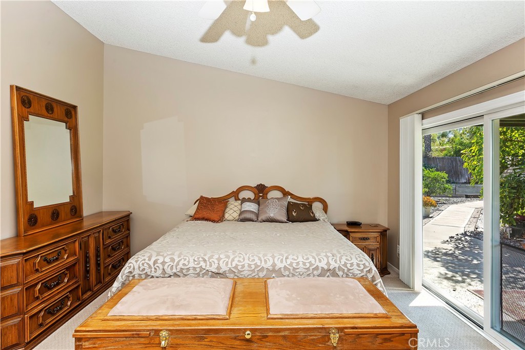 17411 Kaison Circle Riverside, CA 92508 - Photo 27 of 51 a bed sitting in a bedroom next to a window