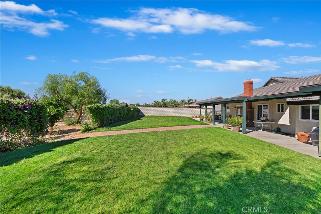 17411 Kaison Circle Riverside, CA 92508 - Photo 37 of 51 a view of a house with a yard and sitting area