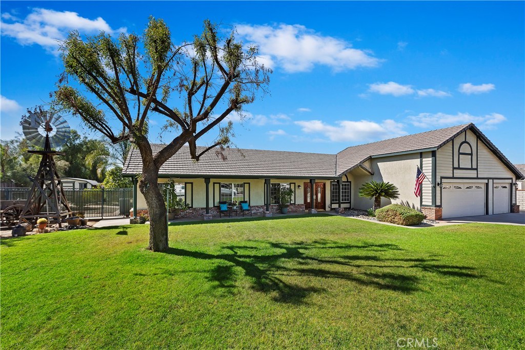 17411 Kaison Circle Riverside, CA 92508 - Photo 7 of 51 a view of a house with a big yard and large trees