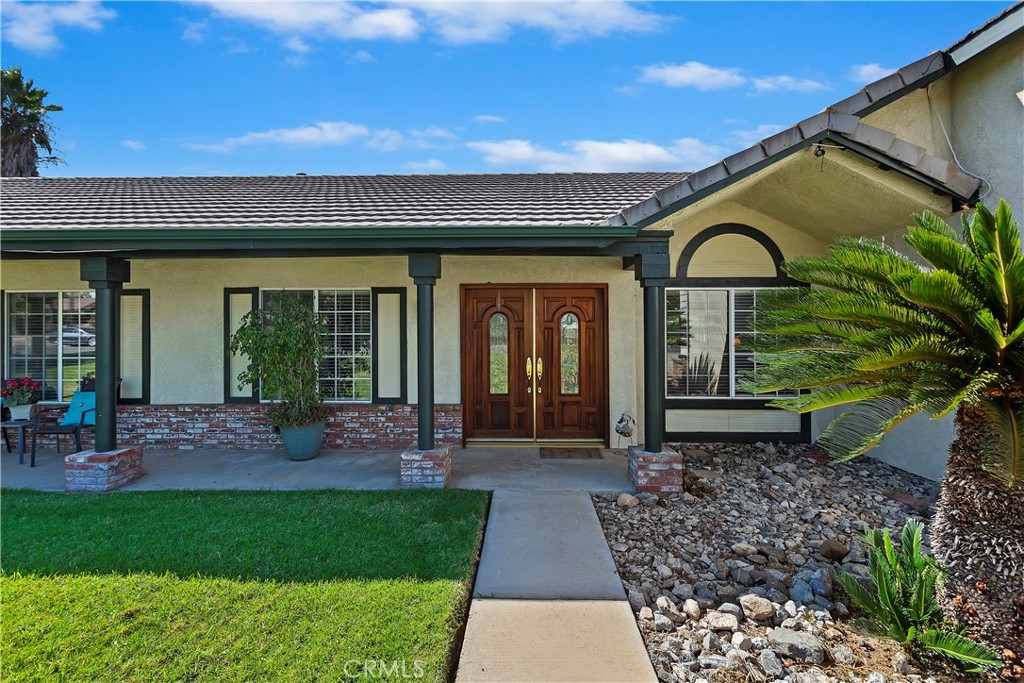 17411 Kaison Circle Riverside, CA 92508 - Photo 8 of 51 a front view of a house with garden