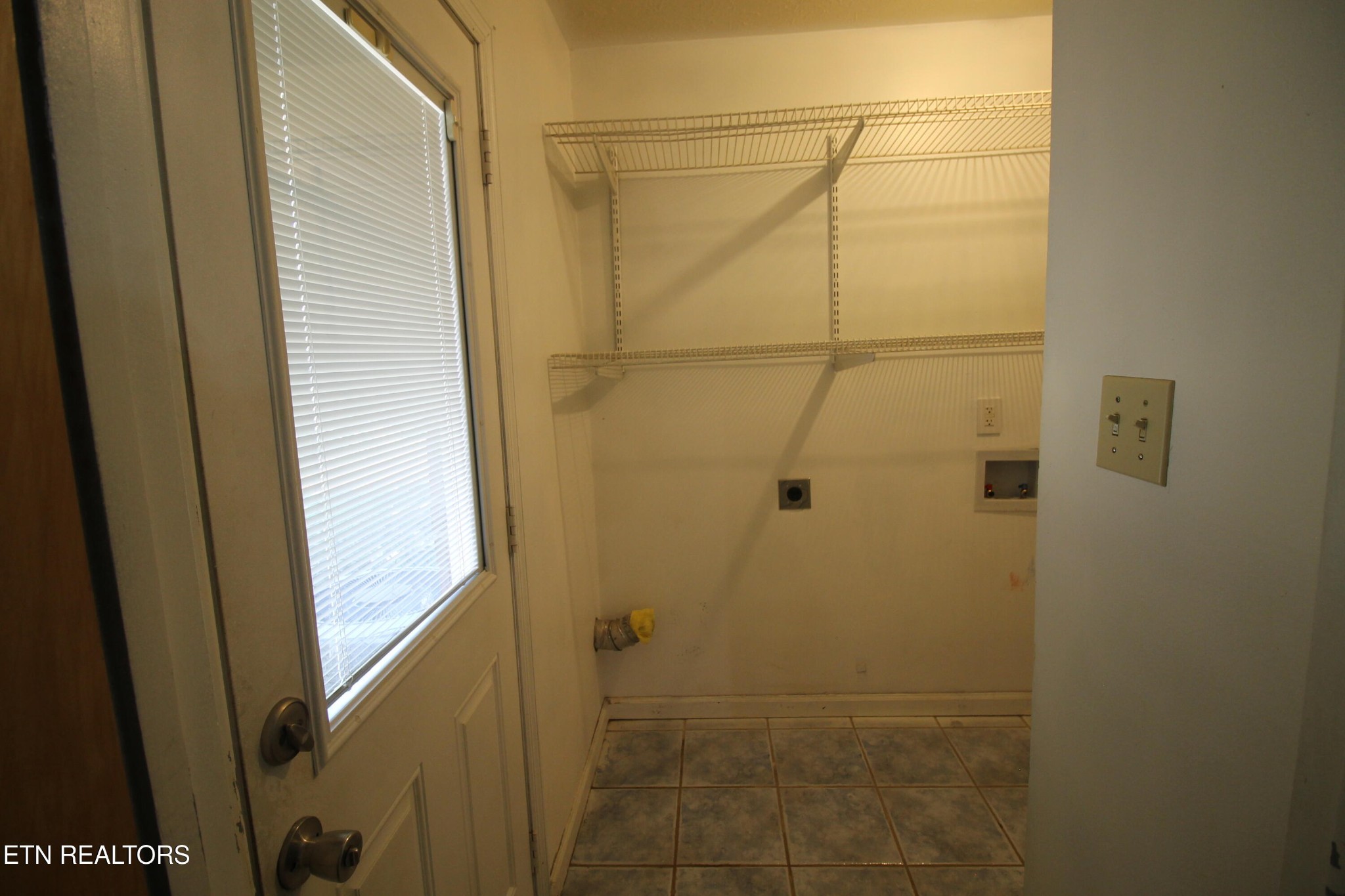 2523 Chukar Road Knoxville, TN 37923 - Photo 16 of 33 a bathroom with a glass door shower