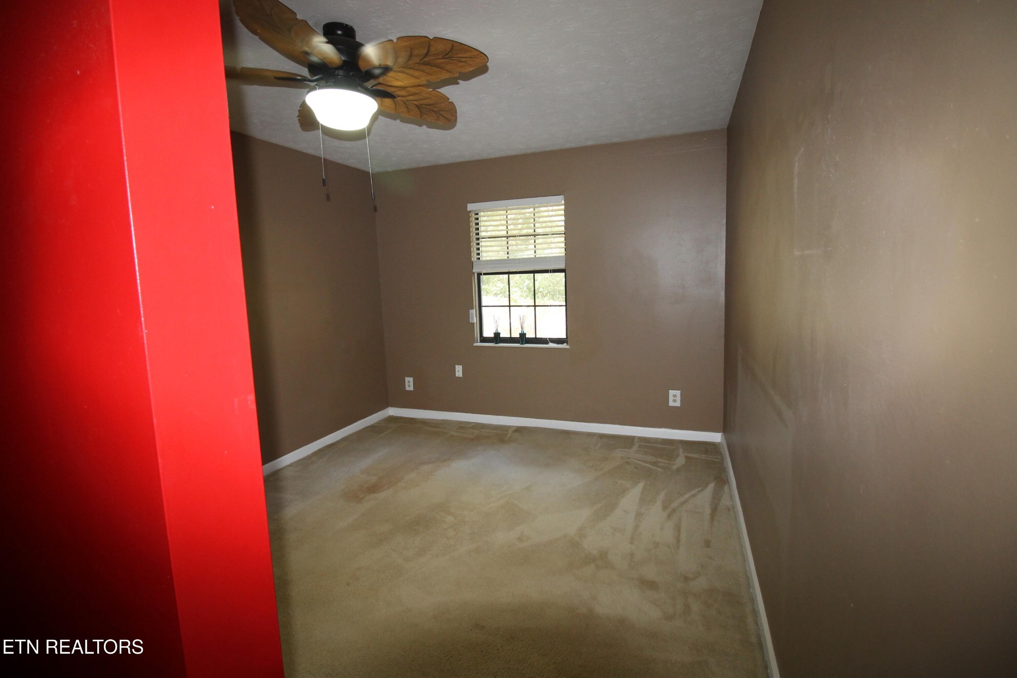 2523 Chukar Road Knoxville, TN 37923 - Photo 27 of 33 a view of an empty room with a window