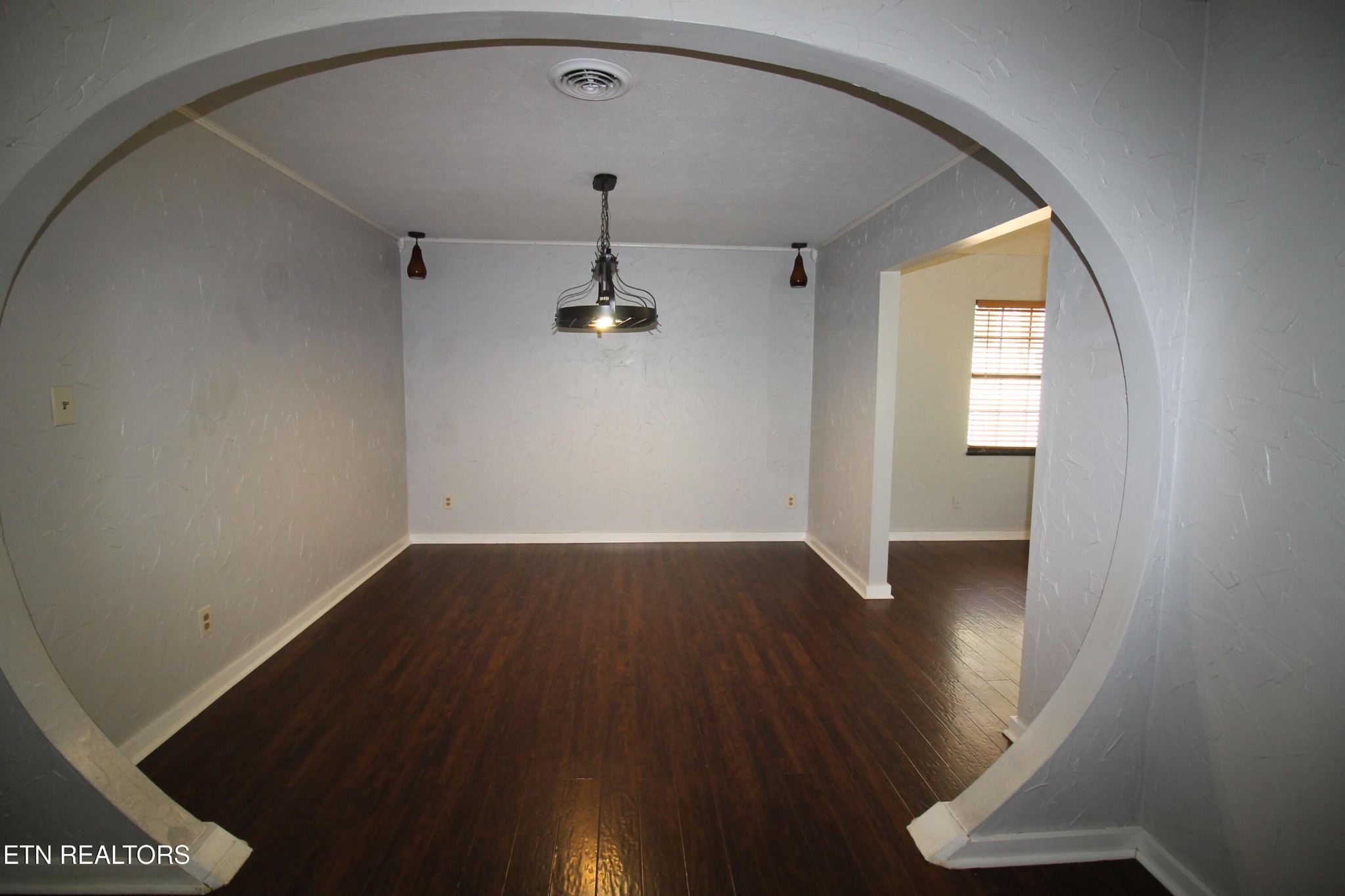 2523 Chukar Road Knoxville, TN 37923 - Photo 32 of 33 a view of empty room with wooden floor and fan
