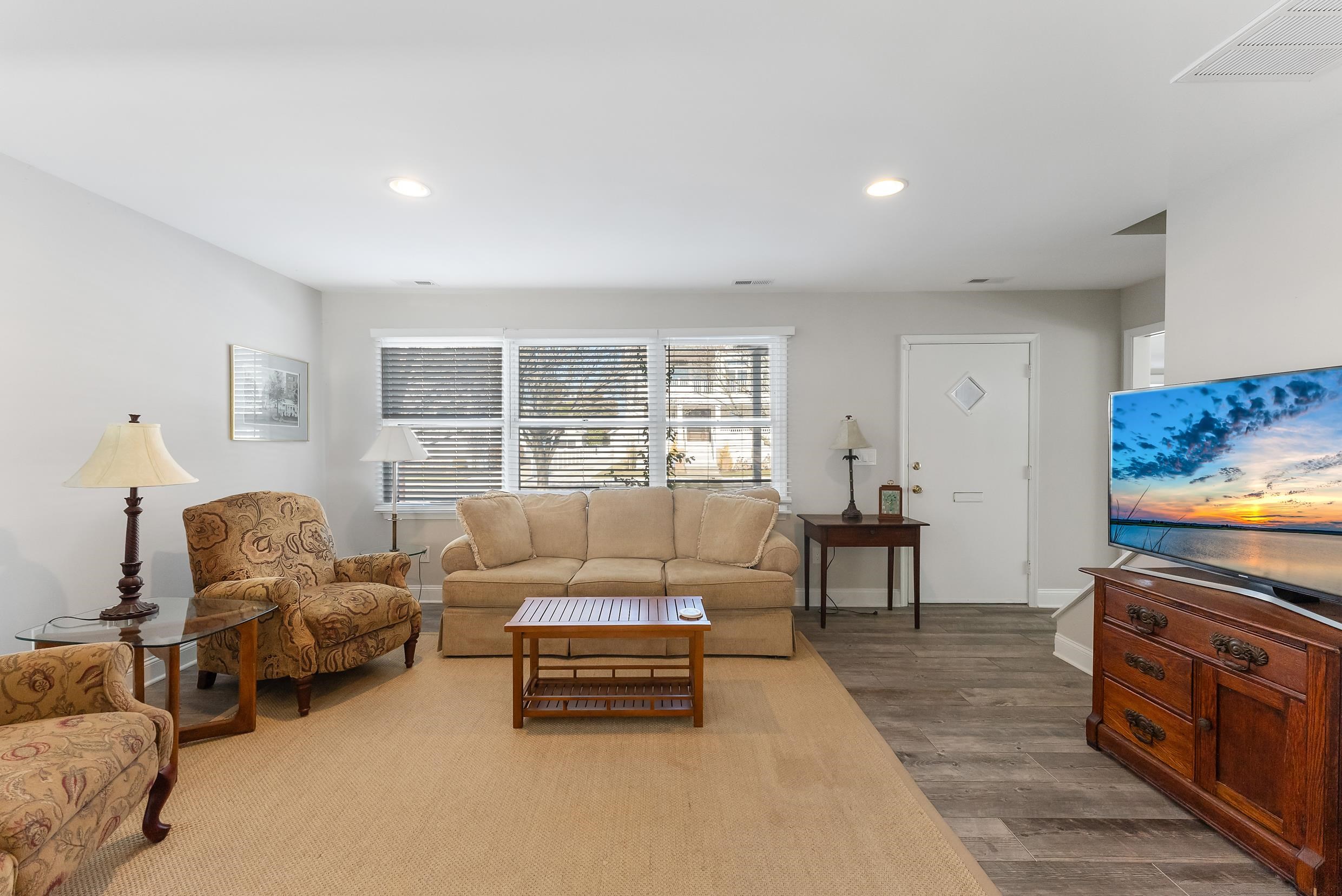 274 52nd Street Avalon, NJ 08202 - Photo 15 of 39 a living room with furniture and a flat screen tv