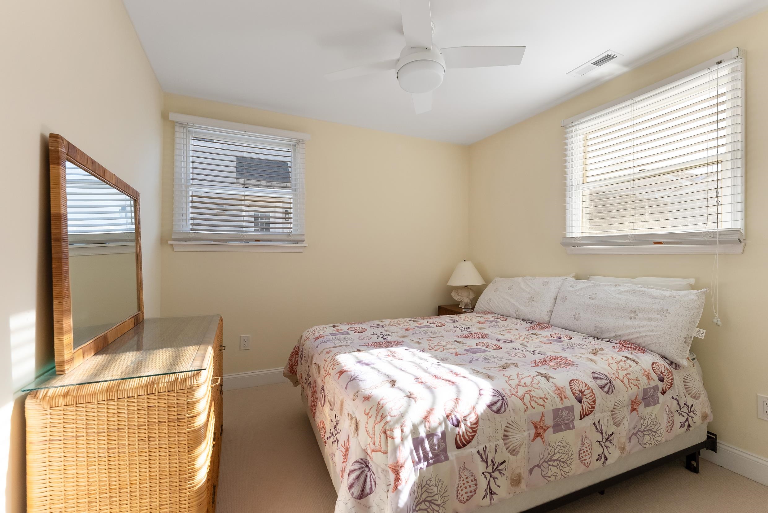 274 52nd Street Avalon, NJ 08202 - Photo 29 of 39 a bedroom with a bed and a window