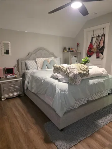 a bathroom with a toilet a sink and a mirror