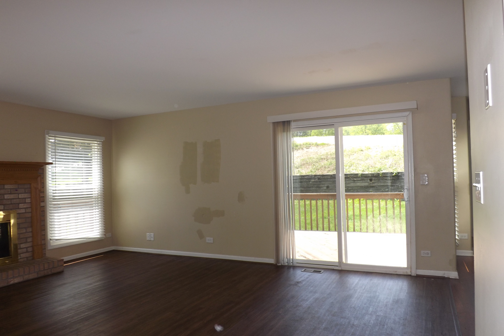 120 Arquilla Drive Algonquin, IL 60102 - Photo 11 of 18 a view of an empty room with wooden floor and a window