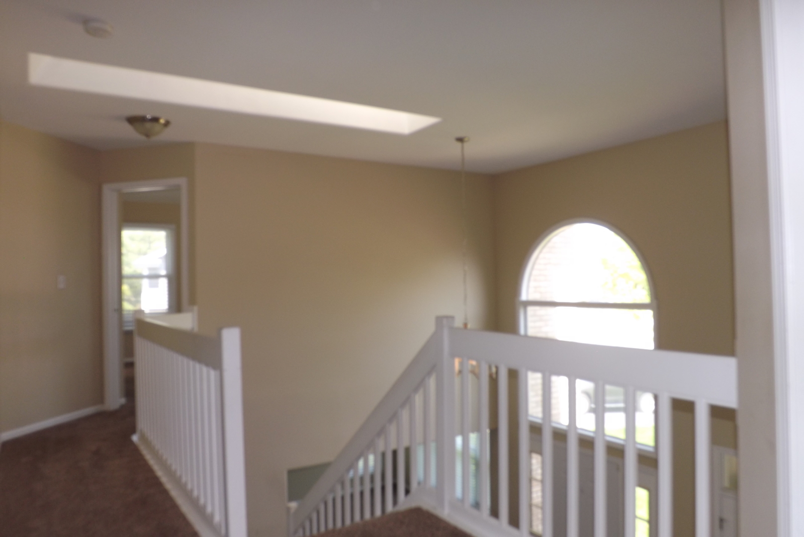 120 Arquilla Drive Algonquin, IL 60102 - Photo 12 of 18 a view of hallway with windows and chandelier
