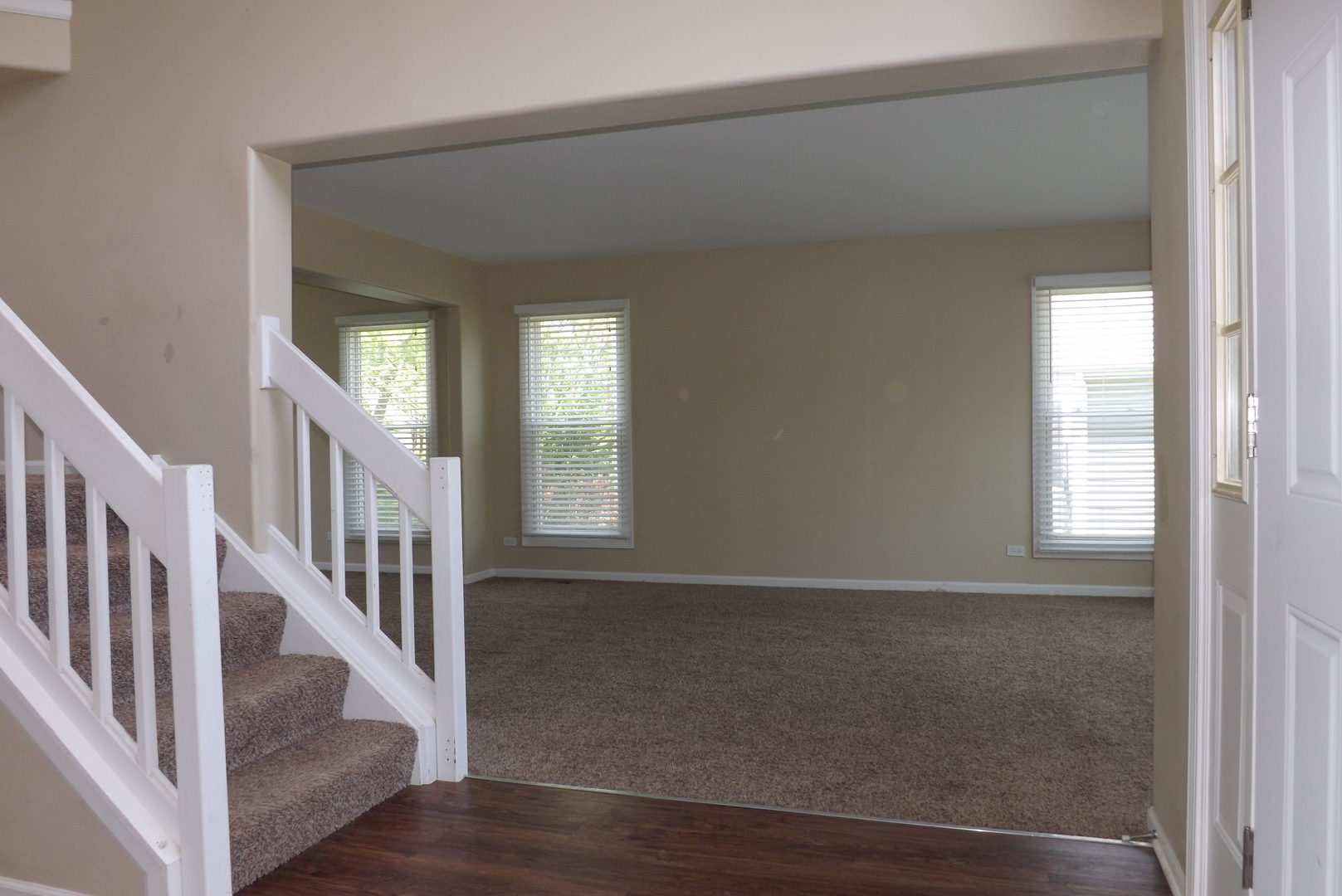 120 Arquilla Drive Algonquin, IL 60102 - Photo 3 of 18 a view of an entryway with wooden floor