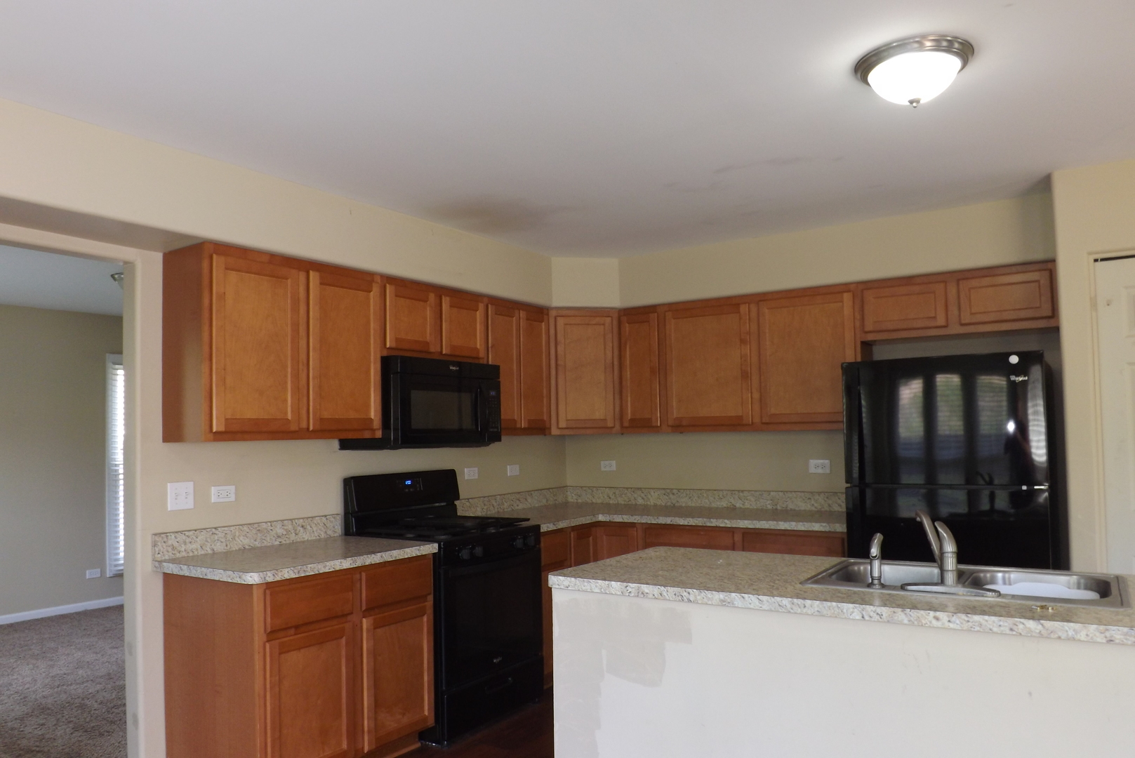 120 Arquilla Drive Algonquin, IL 60102 - Photo 10 of 18 a kitchen with granite countertop a sink and a stove top oven