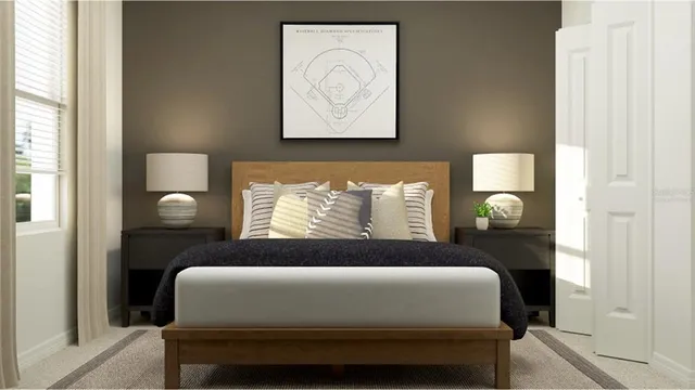 a bedroom with a bed and window