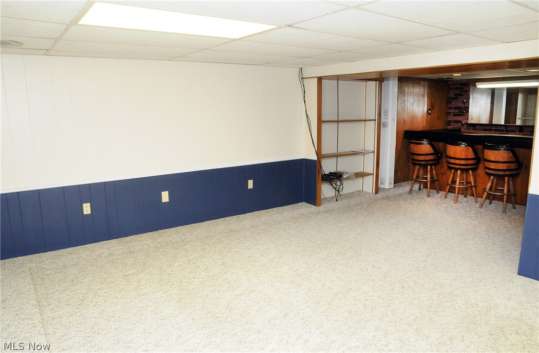 131 Merrick Road Cambridge, OH 43725 - Photo 19 of 33 Family/rec room with bar