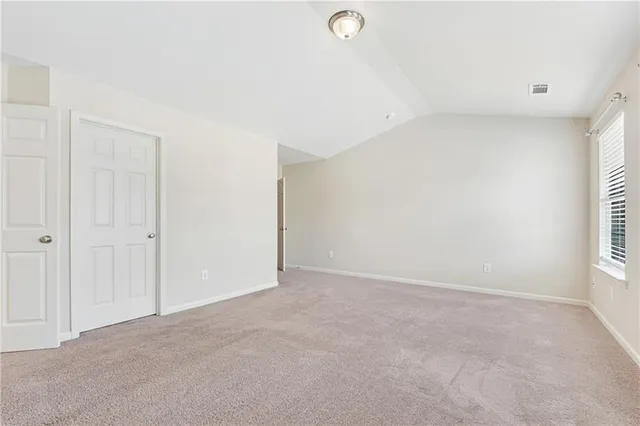 a view of an empty walk in closet