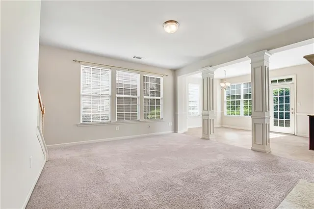 an empty room with windows