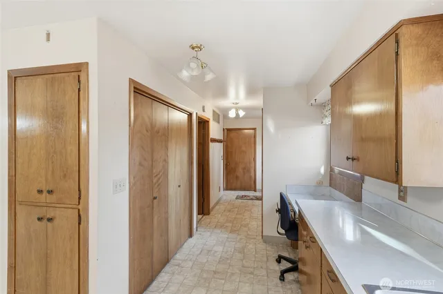 a view of a bathroom from a hallway