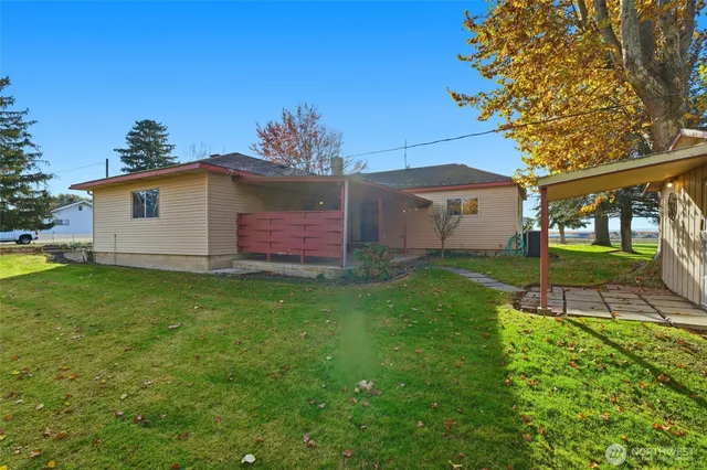 a view of a backyard with a garden