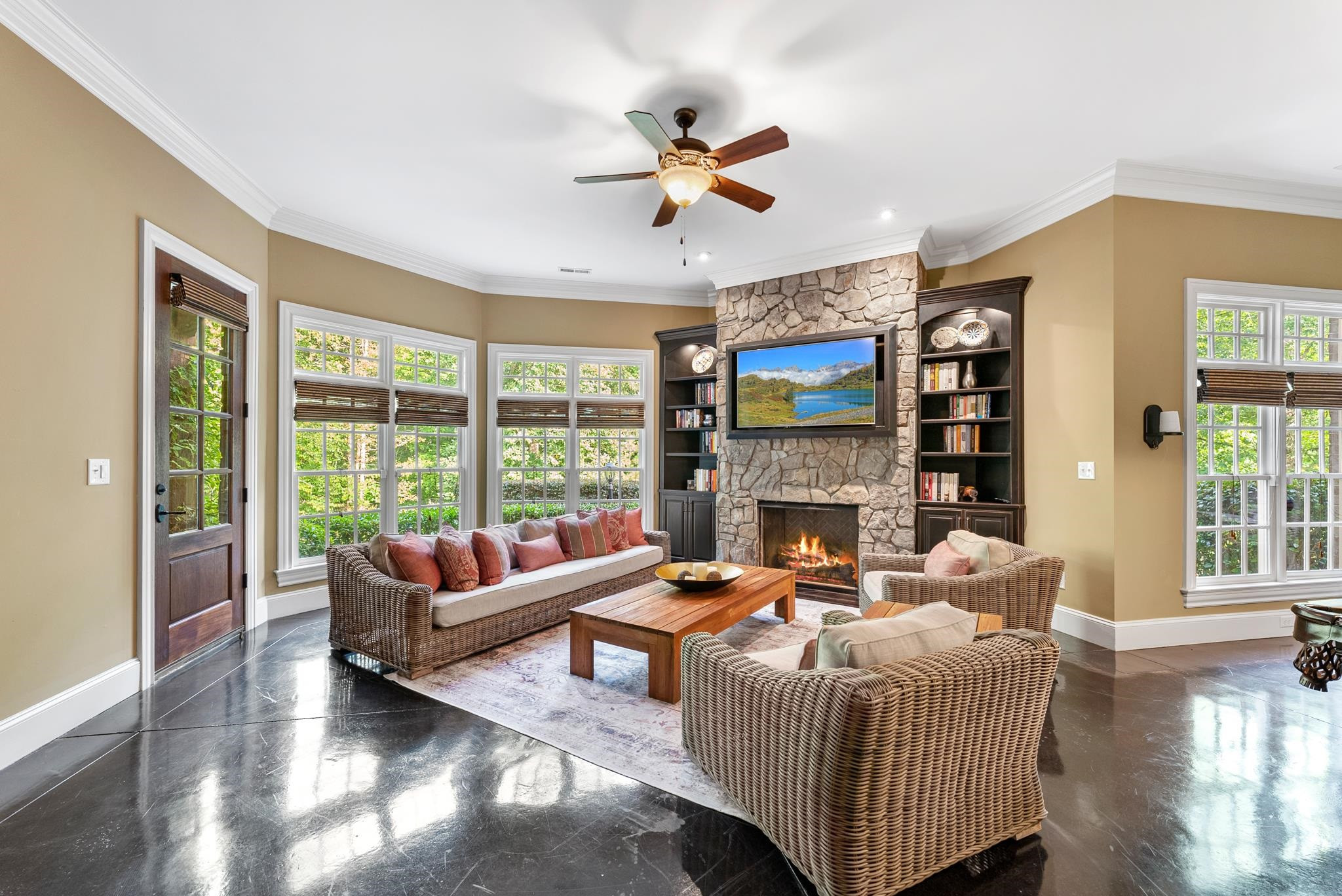 11224 Conley Cove Court Raleigh, NC 27613 - Photo 54 of 81 a living room with furniture large window and a fireplace