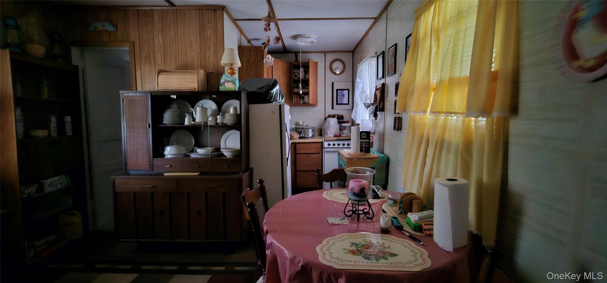 126 Tusten Mountain Lake Road Narrowsburg, NY 12764 - Photo 3 of 11 a view of a dining room with a table and chairs