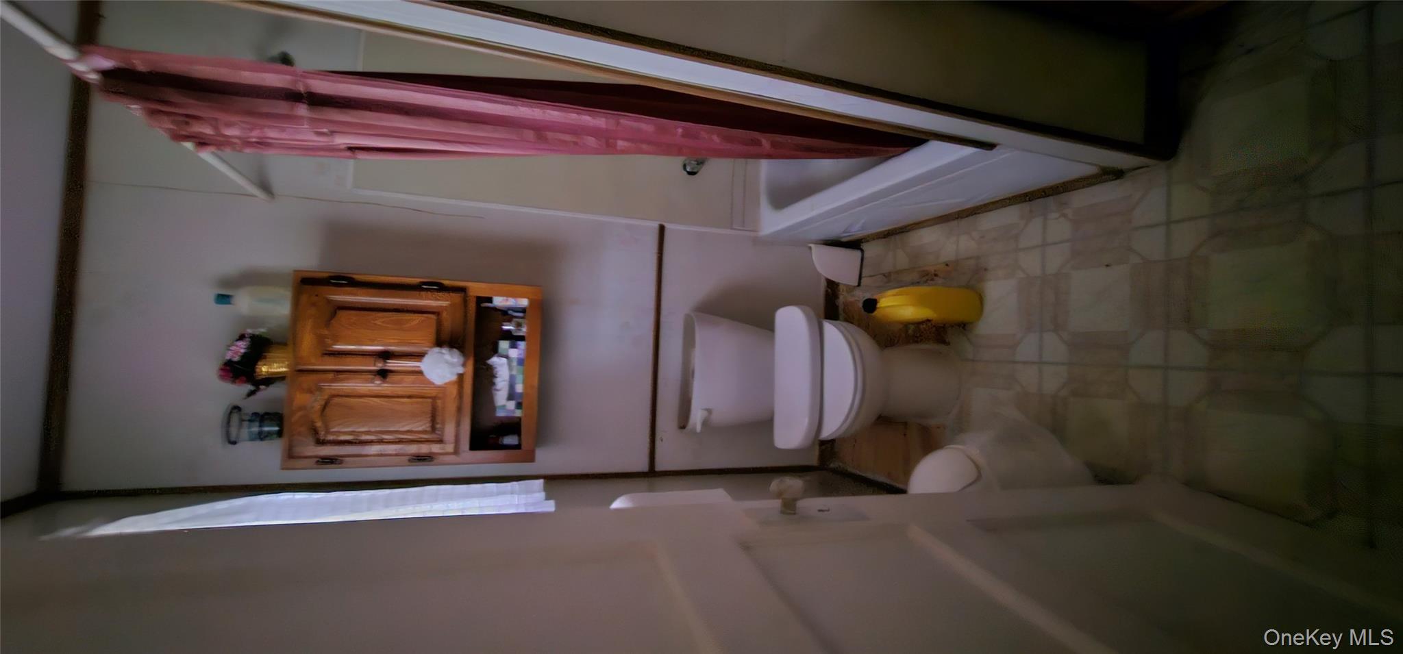 126 Tusten Mountain Lake Road Narrowsburg, NY 12764 - Photo 5 of 11 a living room with furniture and rug