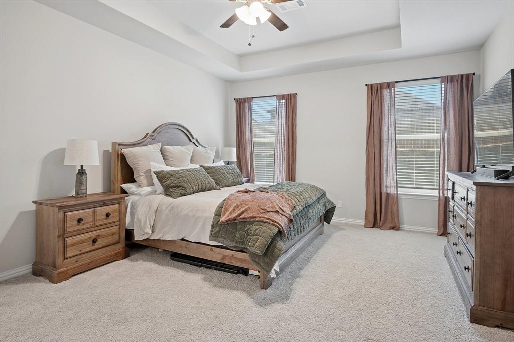 15057 Ted Trail Aledo, TX 76008 - Photo 19 of 35 Primary bedroom off the great room and open view to the backyard